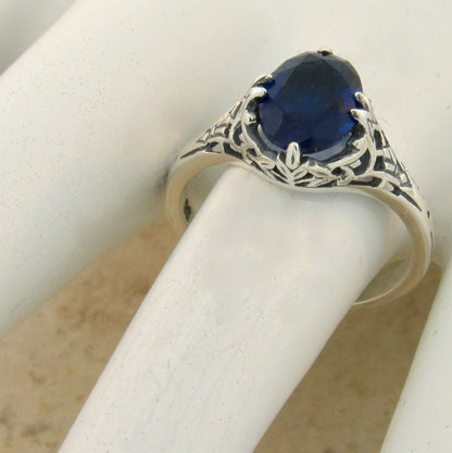 VICTORIAN STYLE 925 STERLING SILVER ROYAL BLUE SIMULATED SAPPHIRE RING     1138Z